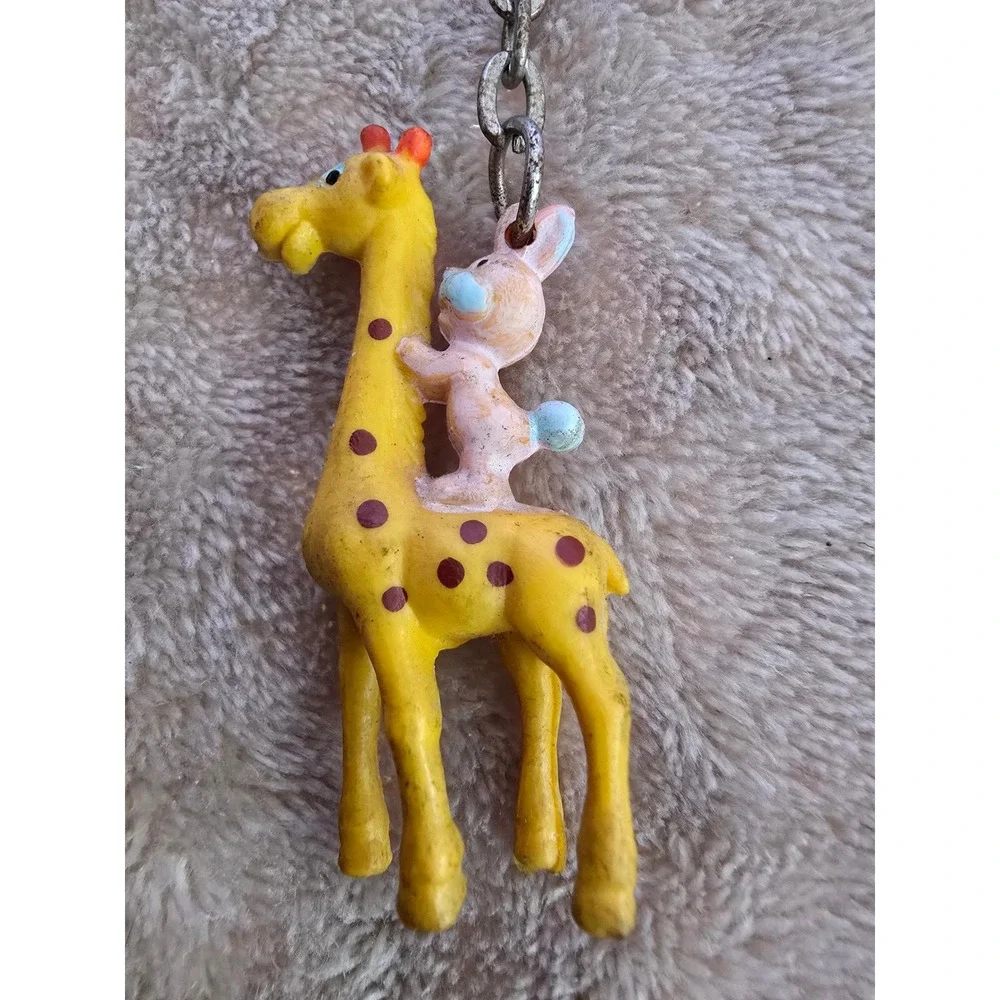 Vintage plastic giraffe and bunny keyring from Suzy's Zoo.